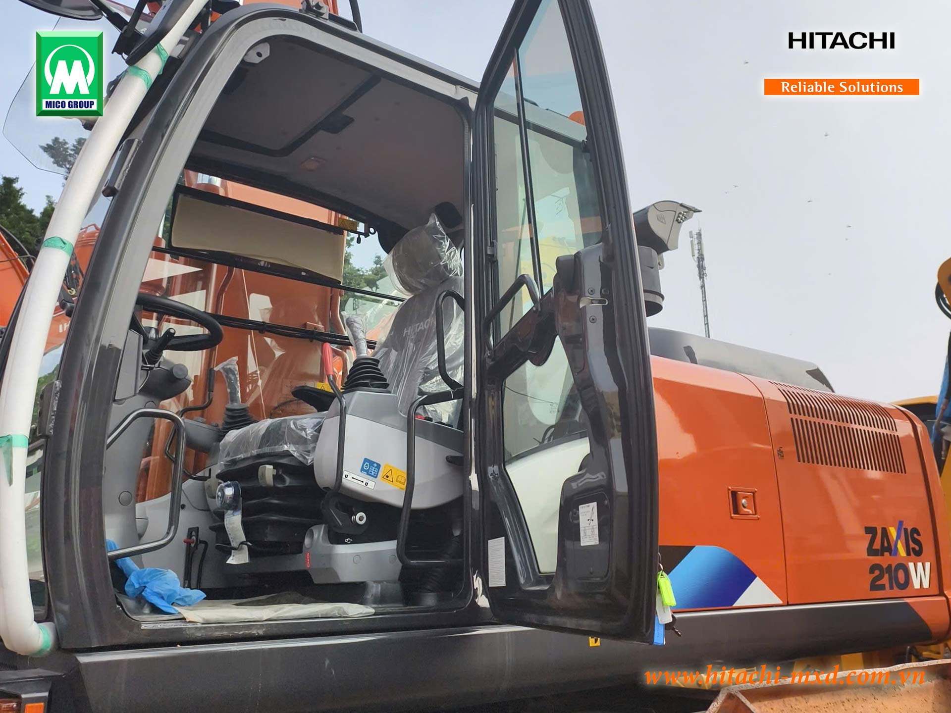 Máy đào bánh lốp HITACHI ZX210W tự hào với năng suất cao và chi phí vận hành thấp